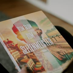 Das Buch Vom Slum zum Seelenmeister in einer Hand